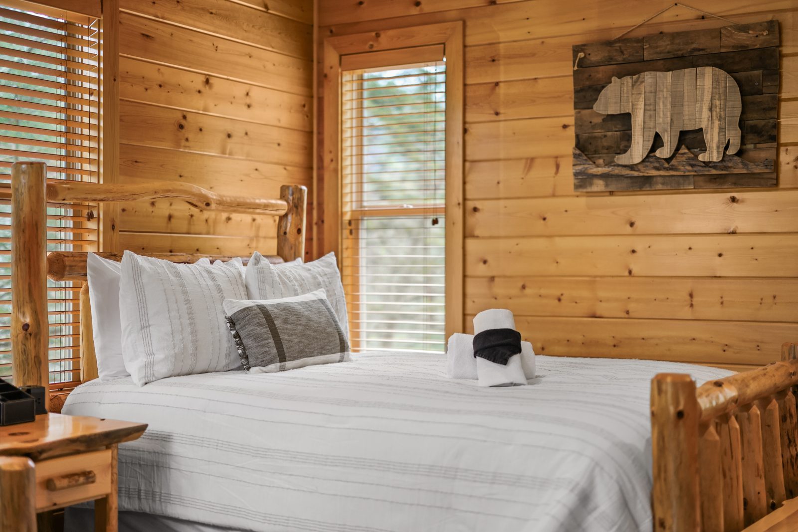 Loft queen bedroom with mountain-view window