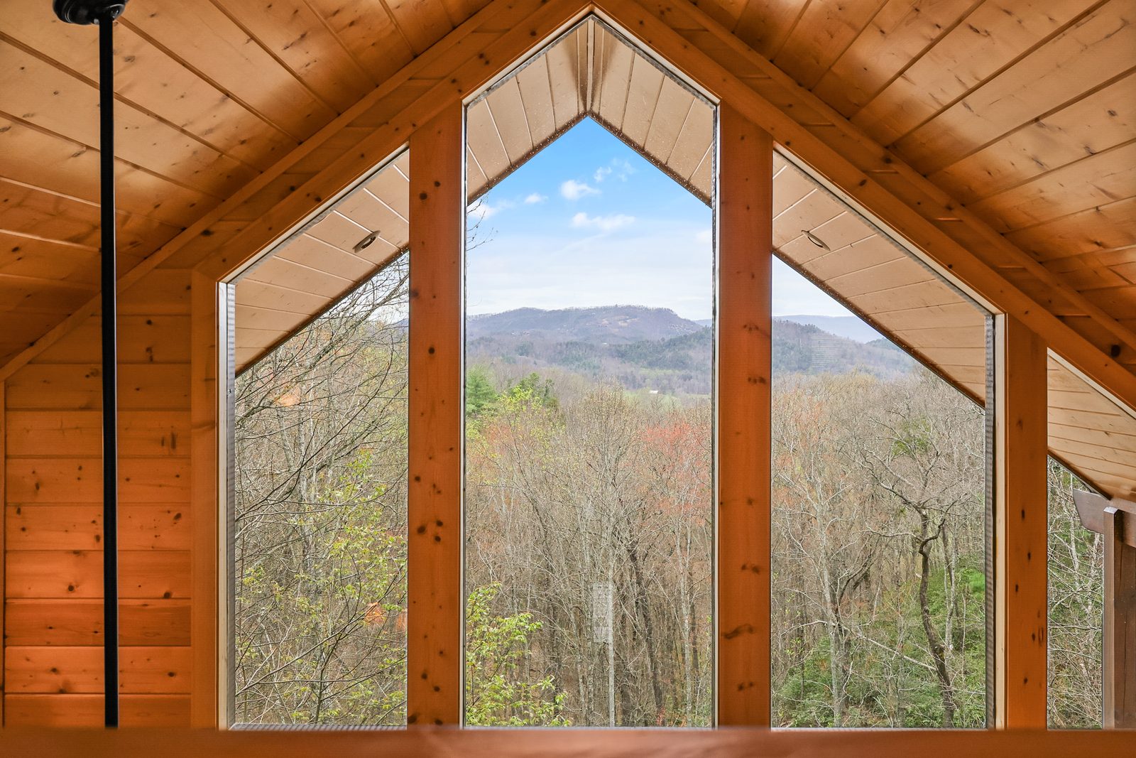 Loft windows framing the valley view